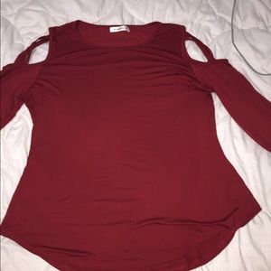 Burgundy shirt with open shoulders